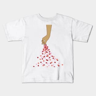 Hand sprinkling red and pink hearts, spread a hopefull message of love and care for each other! Warming Kids T-Shirt